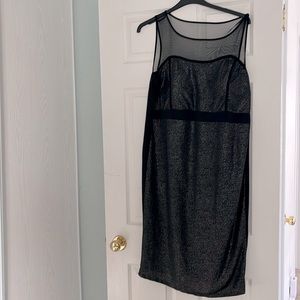 Black sheer neckline holiday dress.